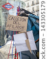 Temporary encampment in Puerta del Sol Madrid with tents tarps signs and temporary structures set up in the central square 143305179