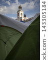 Temporary encampment in Puerta del Sol Madrid with tents tarps signs and temporary structures set up in the central square 143305184