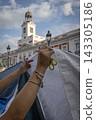 Temporary encampment in Puerta del Sol Madrid with tents tarps signs and temporary structures set up in the central square 143305186