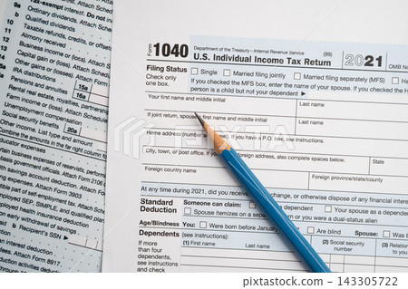 Tax form 1040 U.S. Individual Income Tax Return, business finance. Tax form 1040 U.S. Individual Income Tax Return, business finance. 143305722