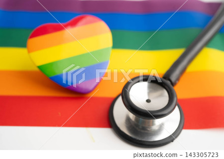 Stethoscope on LGBT rainbow flag, rights and gender equality. Stethoscope on LGBT rainbow flag, rights and gender equality. 143305723