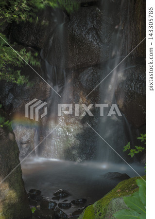 Rainbow over the waterfall basin of Momiji Falls, located in a residential area of Yokohama. Rainbow over the waterfall basin of Momiji Falls, located in a residential area of Yokohama. 143305786