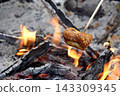 burning firewood in the grill burning firewood in the grill 143309345