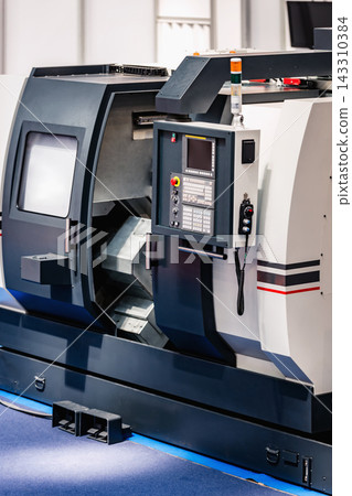 CNC Machine Tool in Modern Manufacturing Workshop CNC Machine Tool in Modern Manufacturing Workshop 143310384