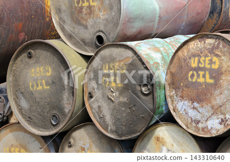 Used Oil Barrels in Rusty Industrial Waste Yard Used Oil Barrels in Rusty Industrial Waste Yard 143310640