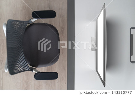 Modern Office Desk with Ergonomic Chair and Computer Monitor Modern Office Desk with Ergonomic Chair and Computer Monitor 143310777