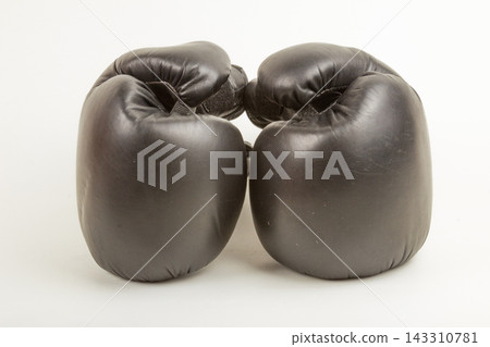 Black Boxing Gloves Isolated on White Background Black Boxing Gloves Isolated on White Background 143310781