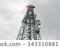 Telecommunication Tower with Antennas Against Cloudy Sky 143310881