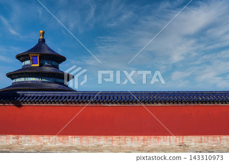 Temple of Heaven in Beijing, China, with a red wall and blue roof under a clear sky Temple of Heaven in Beijing, China, with a red wall and blue roof under a clear sky 143310973