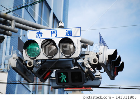 Green light and sign for Akamon Street Green light and sign for Akamon Street 143311903