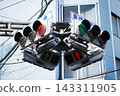 The complex arrangement of traffic lights at Japanese intersections 143311905