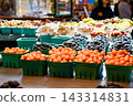 Fresh organic berries and fruits displayed at a stall in the Granville Island Public Market in Vancouver, Canada. 143314831
