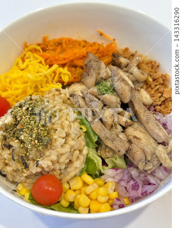 A vibrant poke bowl filled with fresh, marinated fish, rice, and colorful toppings like avocado, seaweed, and sesame seeds. A healthy, satisfying meal with rich textures and flavors. A vibrant poke bowl filled with fresh, marinated fish, rice, and colorful toppings like avocado, seaweed, and sesame seeds. A healthy, satisfying meal with rich textures and flavors. 143316290
