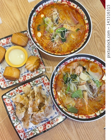 Spicy and numbing malatang with a mix of fresh ingredients in rich Sichuan broth, paired with crispy and tangy guobaorou. A perfect balance of bold heat and sweet-sour crunch for a Chinese feast. Spicy and numbing malatang with a mix of fresh ingredients in rich Sichuan broth, paired with crispy and tangy guobaorou. A perfect balance of bold heat and sweet-sour crunch for a Chinese feast. 143316315