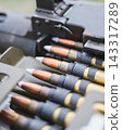 Close Up of Ammunition Belt Loaded Into Heavy Machine Gun 143317289