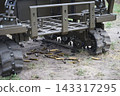 Close up view of a tracked unmanned ground vehicle  143317295