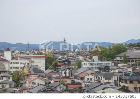 April 30 2026 FUKUSHIMA, JAPAN. Urban skyline and mountains April 30 2026 FUKUSHIMA, JAPAN. Urban skyline and mountains 143317605