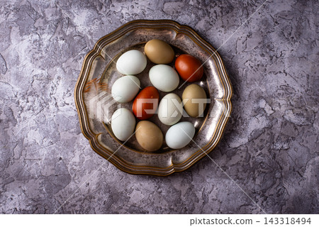 Farm blue, green and brown chicken eggs Farm blue, green and brown chicken eggs 143318494