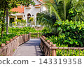 Phu Quoc Island, Vietnam - January 3 2026: Tropical garden walkway with palm trees on Phu Quoc Island 143319358