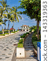Phu Quoc, Vietnam - January 3 2026: Palm-lined tropical promenade near seaside restaurant in Phu Quoc 143319363
