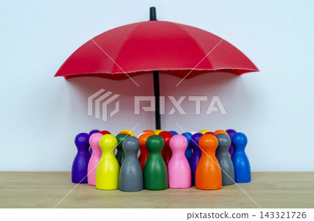 Diverse figures protected under red umbrellas representing inclusive leadership, equal support, and workplace equity Diverse figures protected under red umbrellas representing inclusive leadership, equal support, and workplace equity 143321726