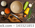 Home cooking vegetable fritters preparation with fresh ingredients on wooden table 143321853