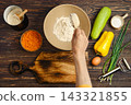 Home cooking vegetable fritters preparation with fresh ingredients in kitchen 143321855