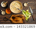 Vegetable fritters are being prepared in a kitchen 143321869