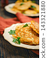 Home cooking vegetable fritters made in kitchen with fresh ingredients 143321880