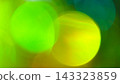 Abstract blurred bokeh background with soft lime green and yellow circles 143323859