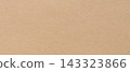 Tan paper texture background with fine grain across a blank matte surface in a warm beige color 143323866
