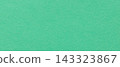 Mint green paper texture background with fine grain on a blank matte surface in a cool color 143323867
