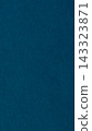 Dark blue paper texture background with fine fibers and grain across a blank matte surface 143323871