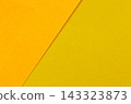 Orange and yellow paper texture background with overlapping sheets and a diagonal edge 143323873