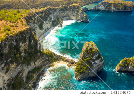 Aerial shot at rocks formation with turquoise sea water at Atuh beach tropical paradise of Bali 143324675