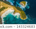 Aerial view on tropical coast Kelingking Beach with turquoise sea in Nusa Penida island, Bali 143324683