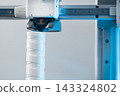 Modern additive manufacturing printhead during calibration proces 143324802