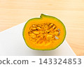 Cut white pumpkin and bright yellow flesh 143324853