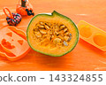 Halloween decorations and a cross-section of a white-skinned pumpkin (Shiro Mikuri) 143324855