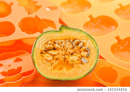 Making Halloween sweets: Ingredients, pumpkin seeds, and cross-section Making Halloween sweets: Ingredients, pumpkin seeds, and cross-section 143324858