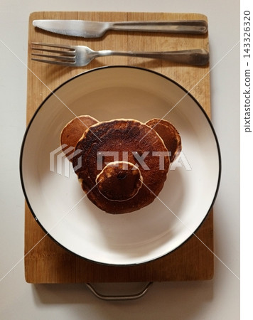 Healthy summer breakfast,homemade classic american pancakes with fresh berry and honey, morning light grey stone background copy space top view Healthy summer breakfast,homemade classic american pancakes with fresh berry and honey, morning light grey stone background copy space top view 143326320
