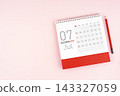 July 2027 desk calendar and red pencil, Position with copy space. 143327059