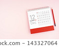 December 2027 desk calendar and red pencil, Position with copy space. 143327064