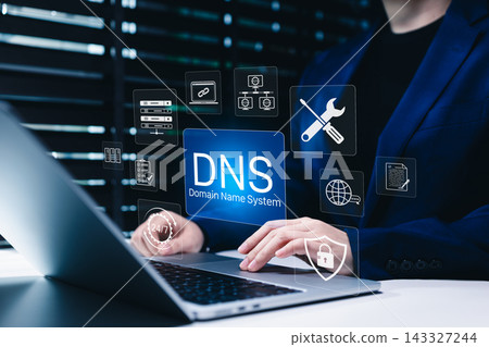 Domain Name System technology supports secure internet. Person manages DNS servers, website connectivity, network maintenance, cybersecurity and 24/7 digital operations for reliable business services Domain Name System technology supports secure internet. Person manages DNS servers, website connectivity, network maintenance, cybersecurity and 24/7 digital operations for reliable business services 143327244