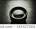 Sake sparkling in a sake cup 143327264