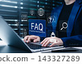 FAQ, Frequently Asked Questions Support Concept. Person using laptop with icon related to search, information, chat, customer service, support represent online help, user assistance, helpdesk, Q and A 143327289