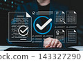 Document verification approval and compliance checklist concept. Person using computer with verified files, check marks, certificate, review forms, quality control, audit process, business assurance 143327290