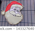 Santa Claus Face Light Sign On A Wire Fence Santa Claus Face Light Sign On A Wire Fence 143327640