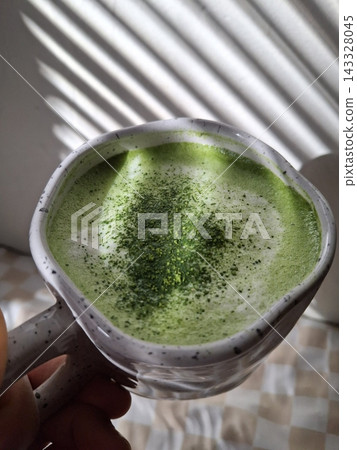 A creamy iced matcha latte with vibrant green tea and smooth milk. Perfectly chilled for a refreshing and energizing drink, offering a balance of earthy matcha and light sweetness. A creamy iced matcha latte with vibrant green tea and smooth milk. Perfectly chilled for a refreshing and energizing drink, offering a balance of earthy matcha and light sweetness. 143328045