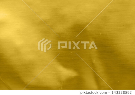 Luxury shiny gold foil surface texture background Luxury shiny gold foil surface texture background 143328892